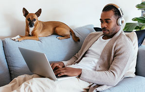 A man watching Courseware videos in laptop